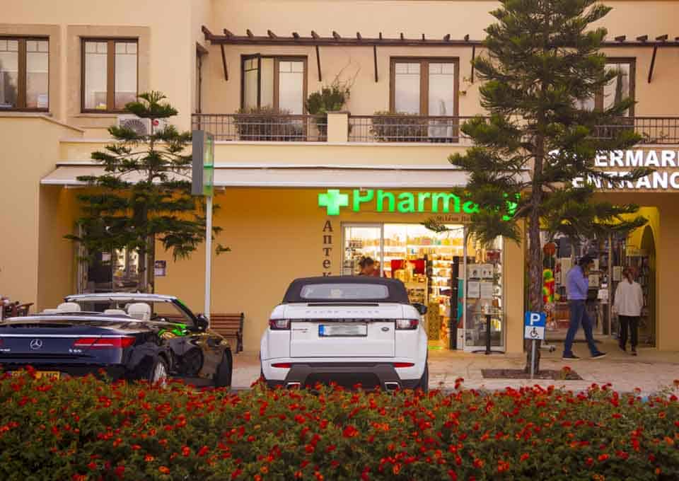 Pharmacy and Supermarket near the central square of the Aphrodite Hills Resort.